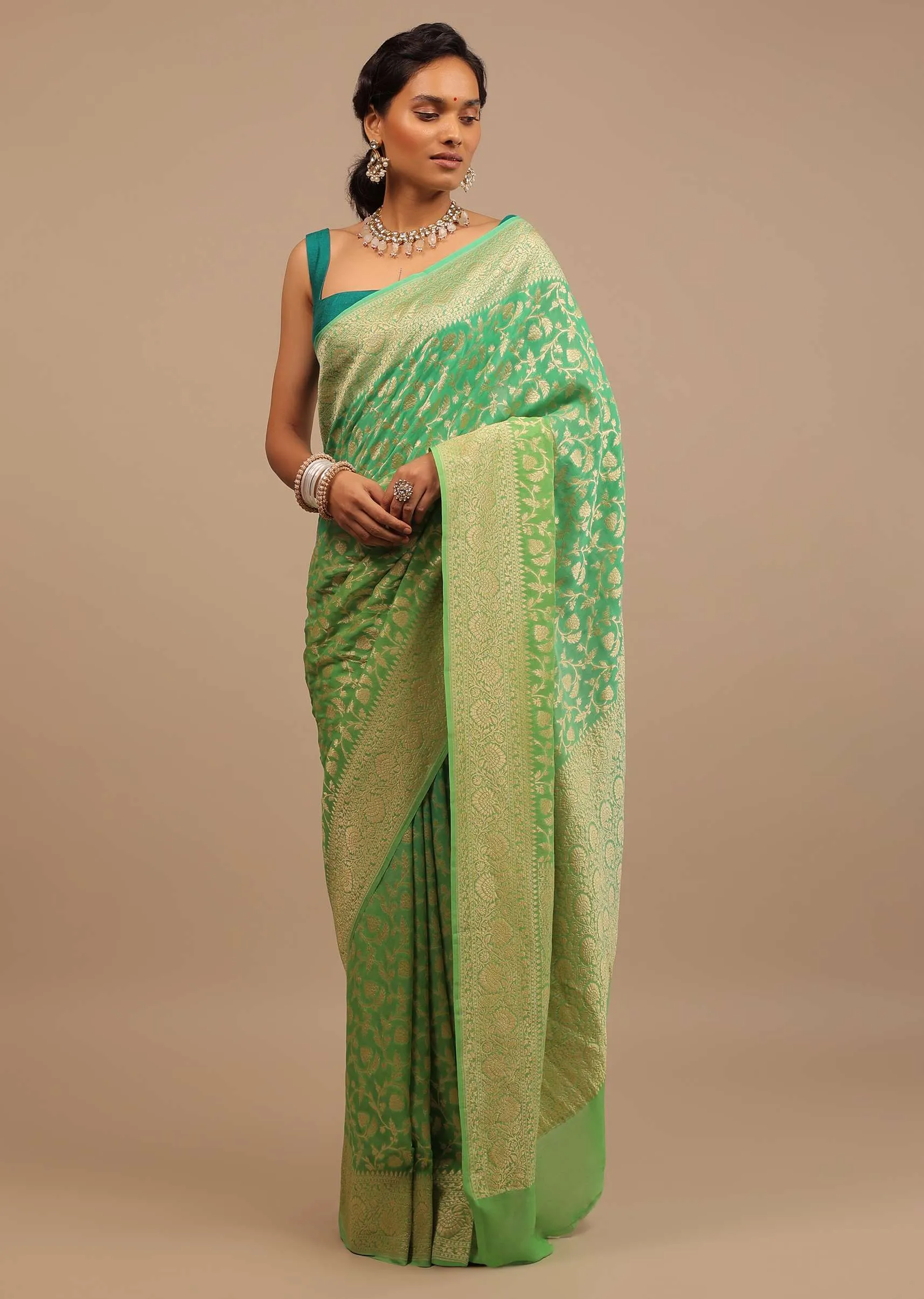 Mint Green Saree With Jaal Work On The Border And Pallu