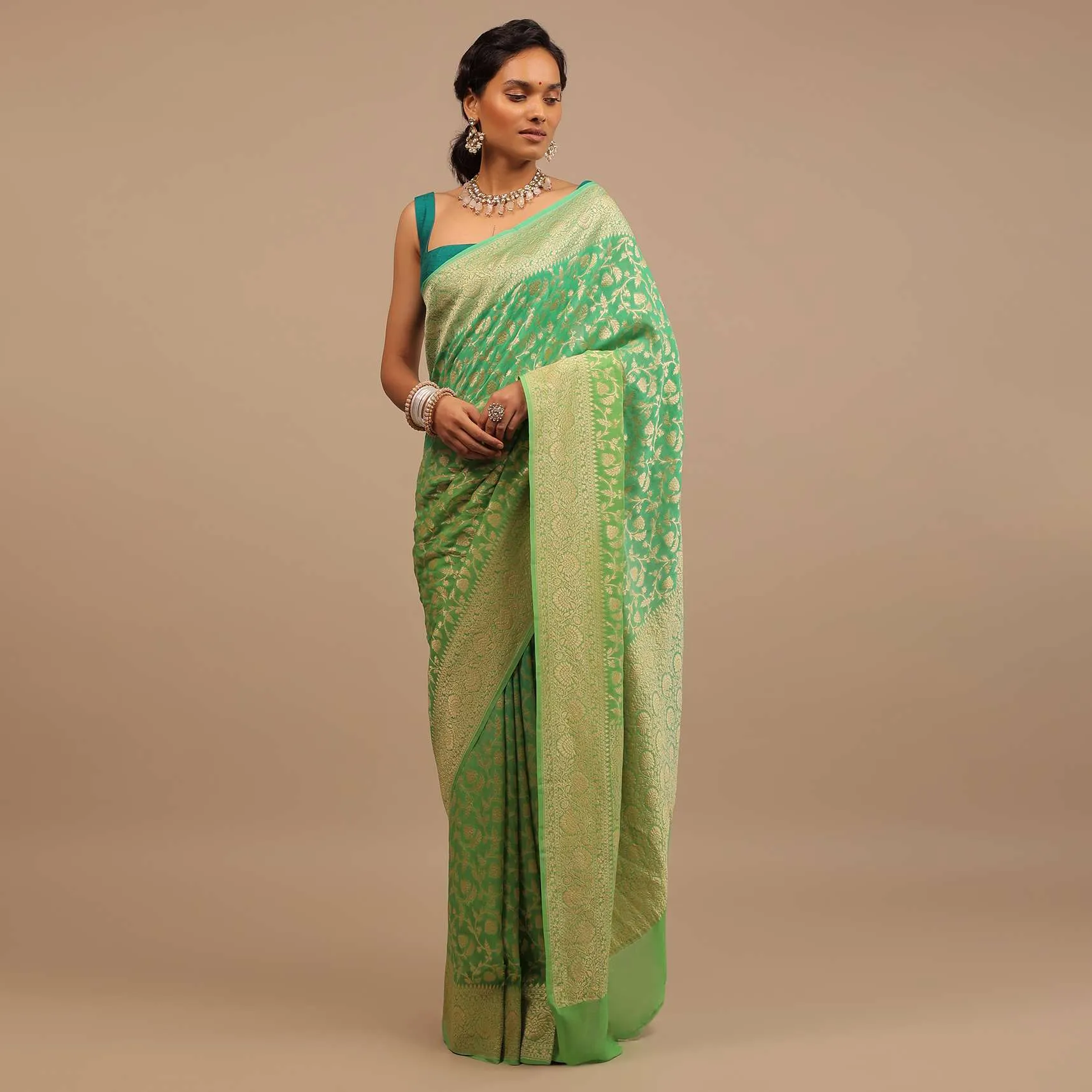 Mint Green Saree With Jaal Work On The Border And Pallu