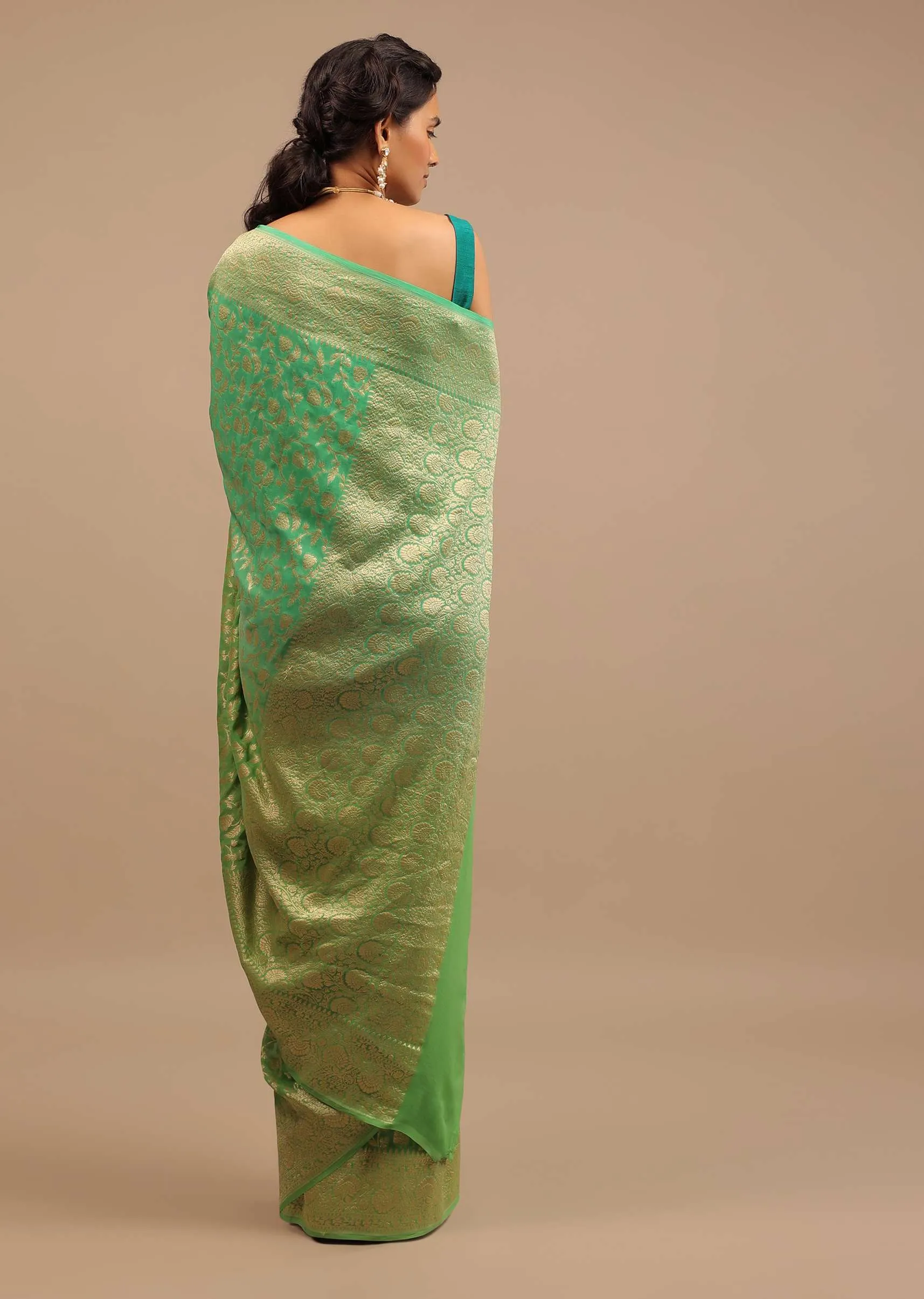 Mint Green Saree With Jaal Work On The Border And Pallu