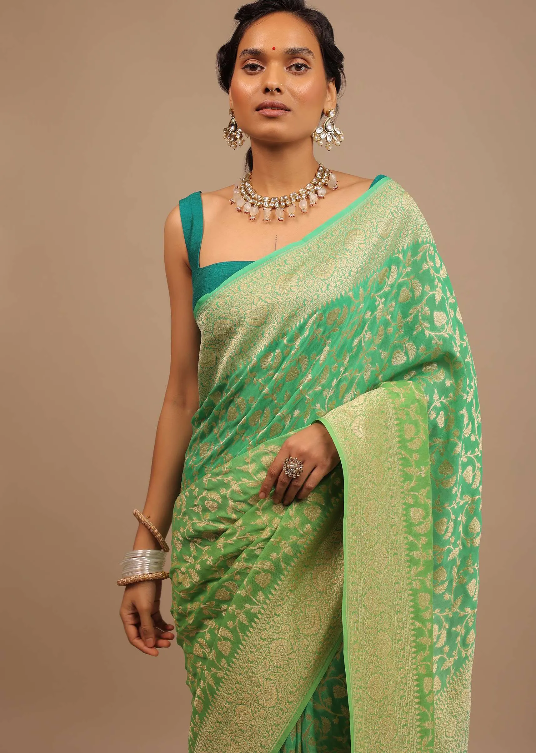 Mint Green Saree With Jaal Work On The Border And Pallu