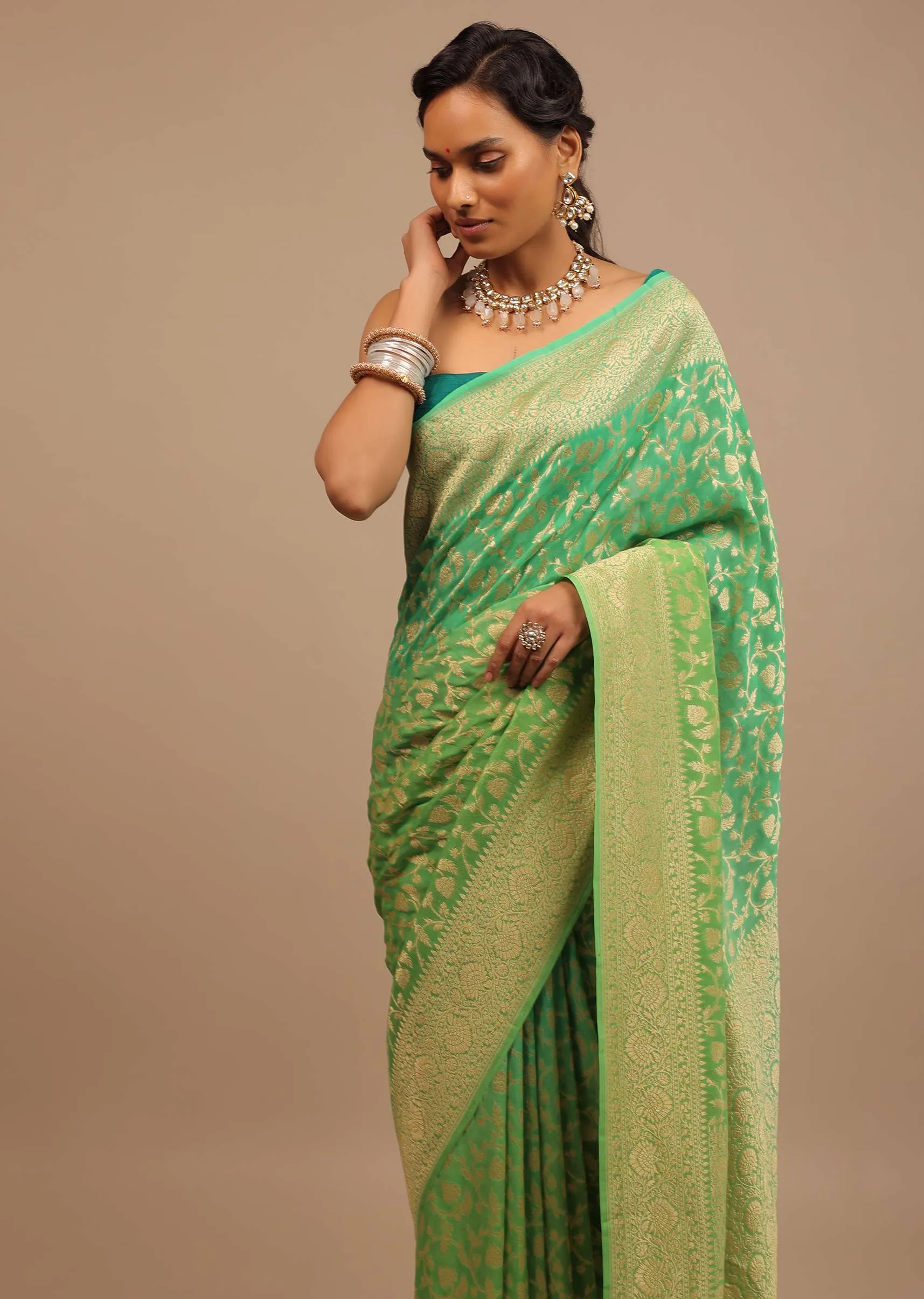 Mint Green Saree With Jaal Work On The Border And Pallu